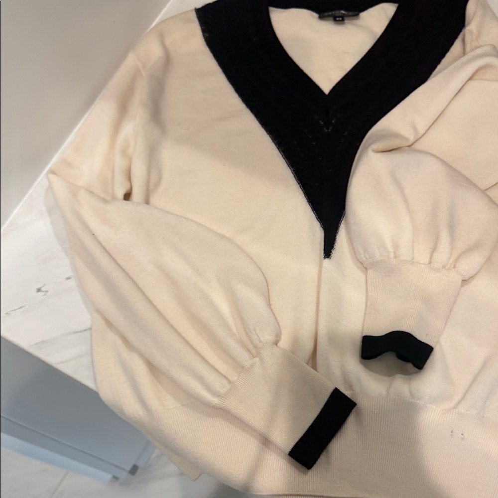 Authentic Chanel V-Neck Sweater in Black and Cream it’s so pretty